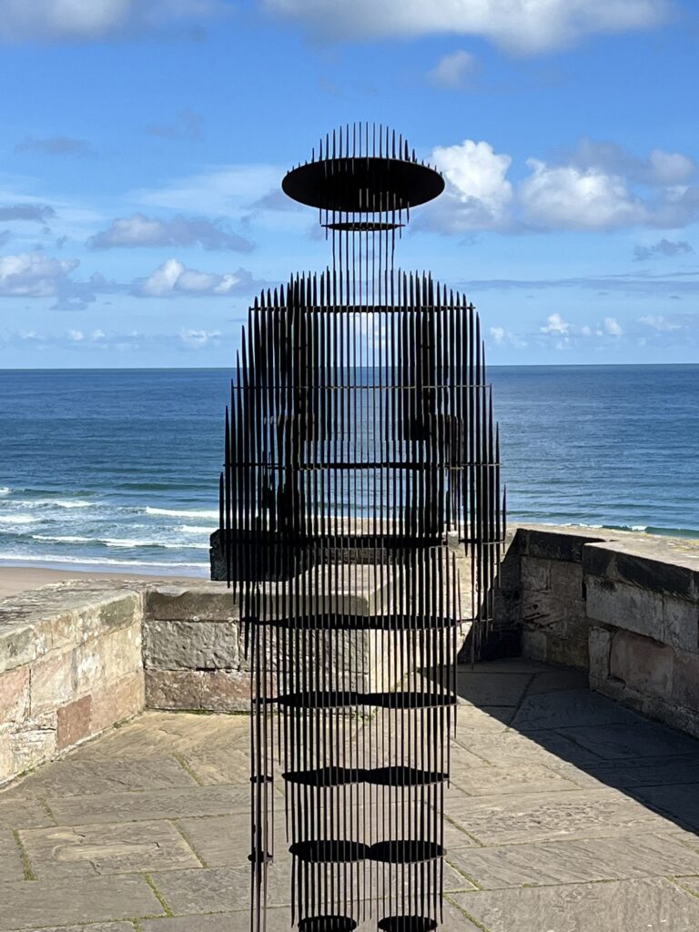 The steel soldier seemingly disappears before your eyes as you pass by. It's vertical plates make an outline of the shape of a soldier 